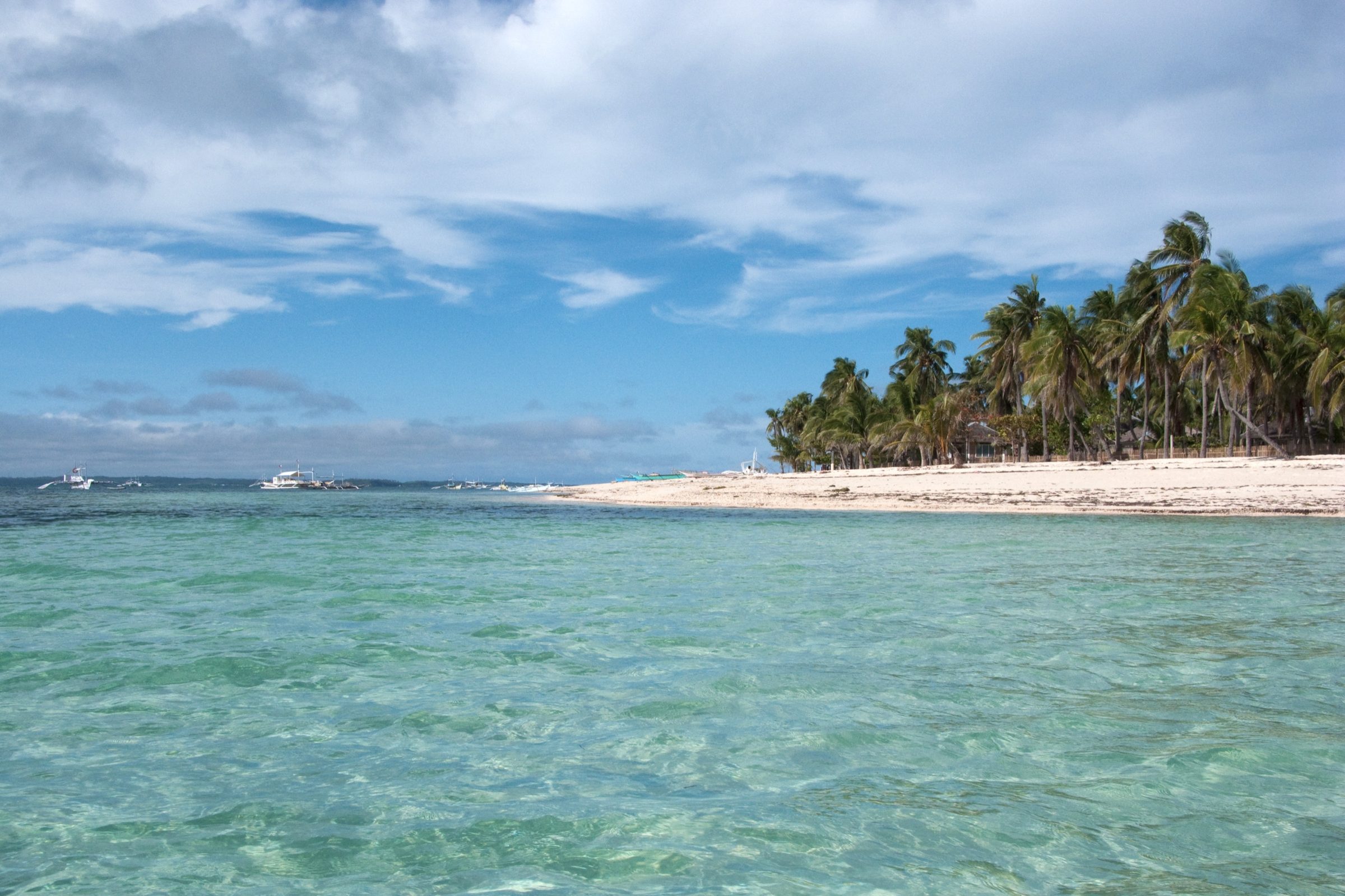 Turquoise water and white-sand tropical beach in Palm Beach, Florida