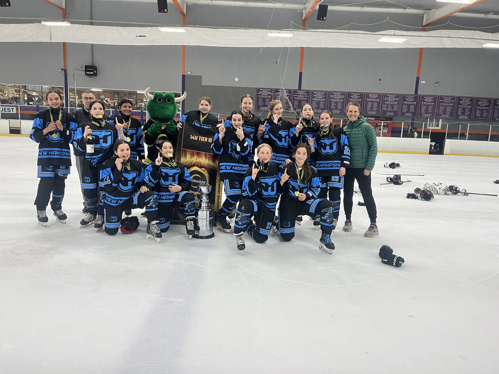 OneHockey youth team celebrating
