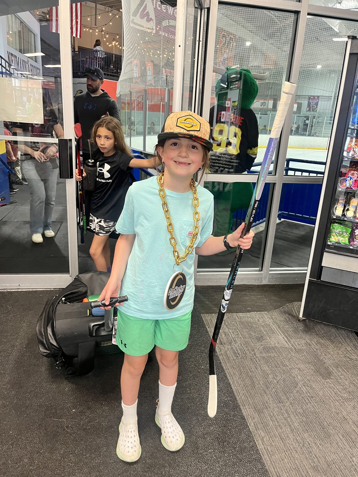 OneHockey youth team celebrating a championship